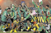 EMOTIONAL: Zambia's national soccer team celebrate after winning the 2012 African Cup of Nations tournament final match against Ivory Coast at the  Friendship Stadium in Gabon's capital Libreville on Sunday.  PHOTOS: GALLO  IMAGES