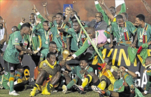 EMOTIONAL: Zambia's national soccer team celebrate after winning the 2012 African Cup of Nations tournament final match against Ivory Coast at the Friendship Stadium in Gabon's capital Libreville on Sunday. PHOTOS: GALLO IMAGES