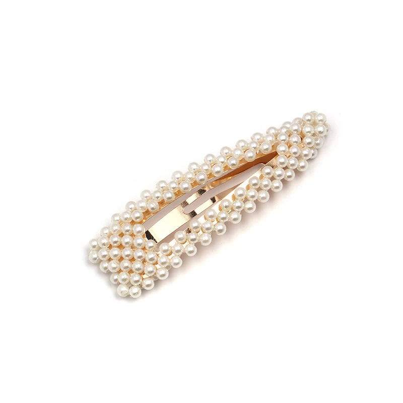 Barrette à cheveux géométrique simple et perle pour femmes Sublimez vos coiffures avec élégance. Un accessoire de mode facile à porter pour un style impeccable.