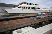 One of the Robben Island Ferry's in a forecourt at an industrial building in Paarden Island, Cape Town.