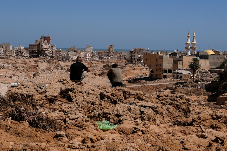 People look at an area in Derna that was obliterated in the flood, Libya, September 14 2023. Picture: ESAM OMRAN/REUTERS
