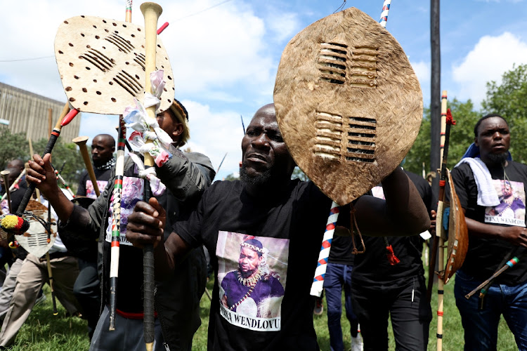 Amabutho wearing T-shirts bearing Prince Misuzulu kaZwelithini Zulu's image arrive at the Pietermaritzburg high court.