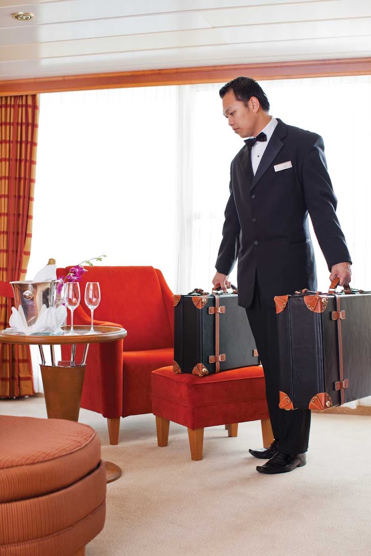 A butler prepares to handle guests' luggage during a  Regent Seven Seas voyage.