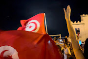 Saied's move to seize executive control appears to have widespread popular support in Tunisia, where years of misgovernance, corruption, political paralysis and economic stagnation have been aggravated this year by a deadly surge in Covid-19 cases.  THIS IMAGE HAS BEEN SUPPLIED BY A THIRD PARTY. MANDATORY CREDIT. NO RESALES. NO ARCHIVES