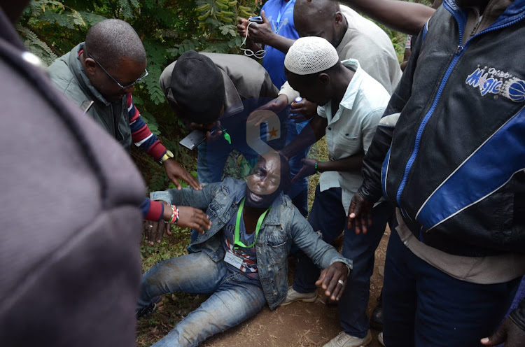 Azimio supporter faints outside the main gate as they welcome Wiper party leader Kalonzo Musyoka outside Bomas on August 15th 2022.