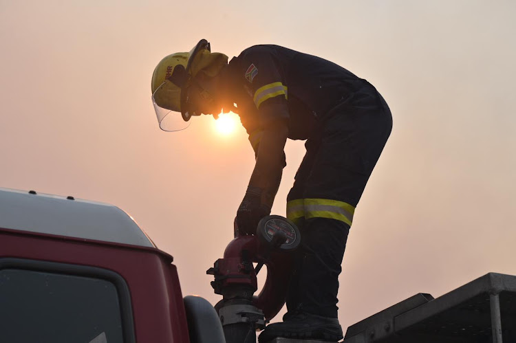 Firefighters have been working since Sunday morning to extinguish the runaway fire that engulfed Rhodes Memorial and spread towards the University of Cape Town.