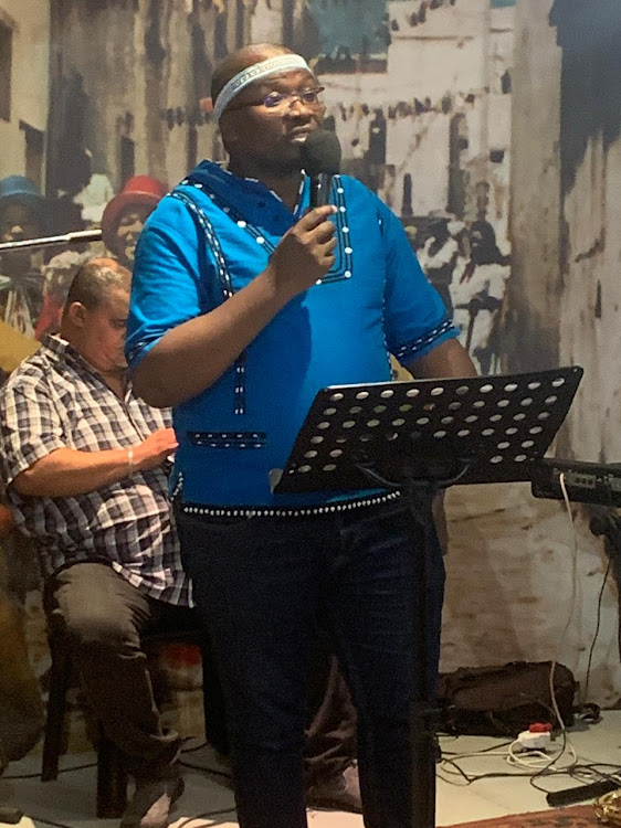 Black Lawyers Forum deputy president Bayethe Maswazi speaking at the District Six Homecoming Centre on Sunday.