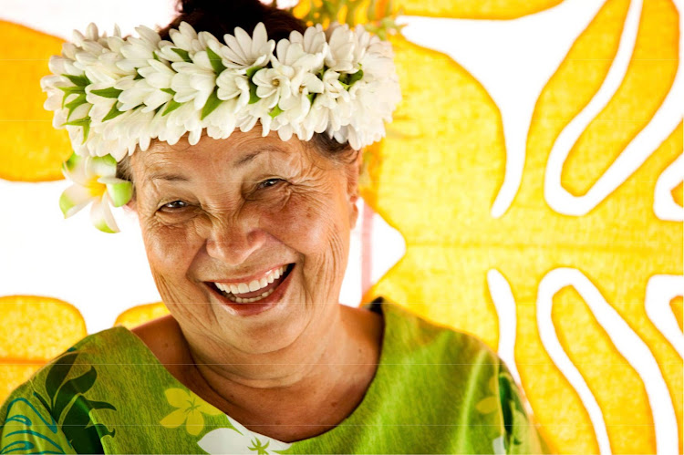 A Cook Islands local flashes a welcoming smile. 