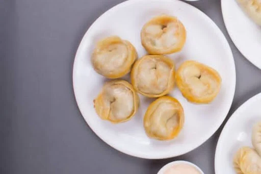 Chicken Achari Steamed Momos [6 Pieces]