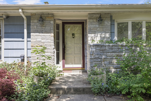 House entrance with stone siding in this luxury property for sale in Dartmouth ($769,000)