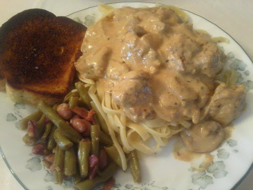 Chicken Dijon with veggie and garlic toast.