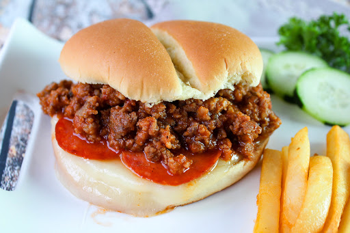 An Italian sloppy joe served with French fries.