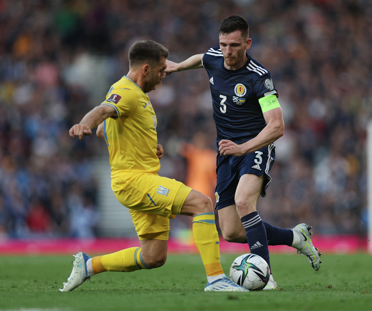 Ukraine's Oleksandr Karavaev in action with Scotland's Andy Robertson Action Images via Reuters/Lee Smith