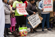 About 50 supporters of Public Transport Voice, the Treatment Action Campaign and Right2Know Campaign marched through Cape Town train station to protest against the deteriorating railway system. Picture Credit: Ashraf Hendricks