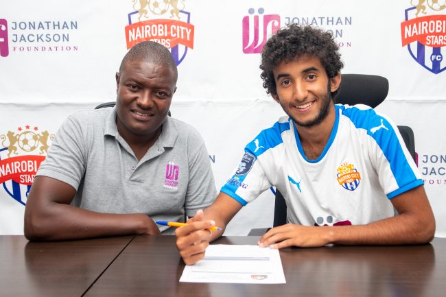 City Stars team coordinator Samson Otieno with Mohammed Bajaber aka Hamudi after he signed a loan move on Friday