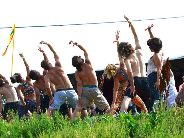 view of a group of people doing yoga