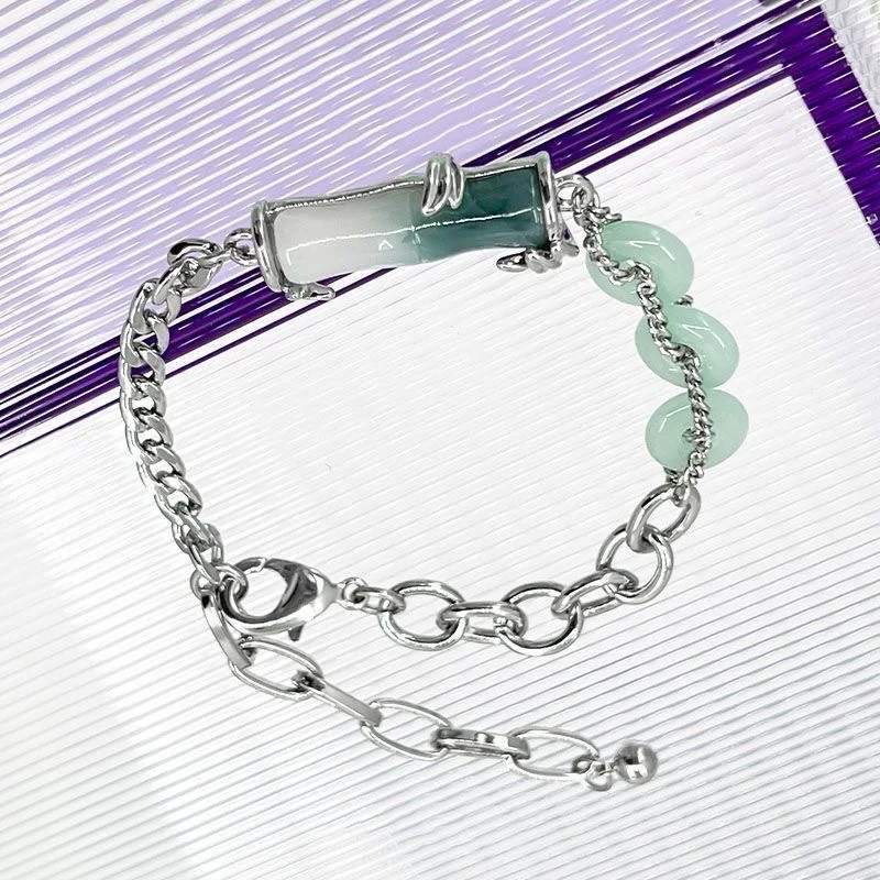 Bracelet en bambou avec boucle et design encre. Élégance naturelle à votre poignet. Profitez de la durabilité et du style unique. Un accessoire indispensable.