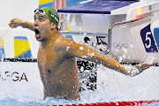 South Africa's Chad le Clos celebrates winning the men's Olympic 200m butterfly final at the Aquatics Centre in London last night. The 20-year-old stunned the swimming world by edging out US great Michael Phelps with his final stroke Picture TOBY MELVILLE/REUTERS
