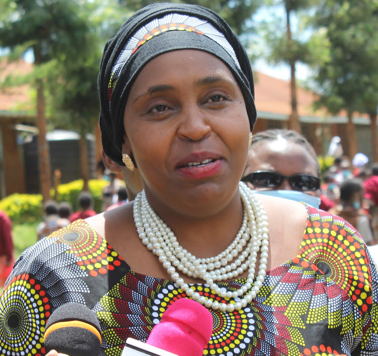 Nyeri deputy governor Caroline Karugu addresses the media at DEB Muslim Primary School in Nyeri town during celebrations to mark the world menstrual hygiene day on Friday.