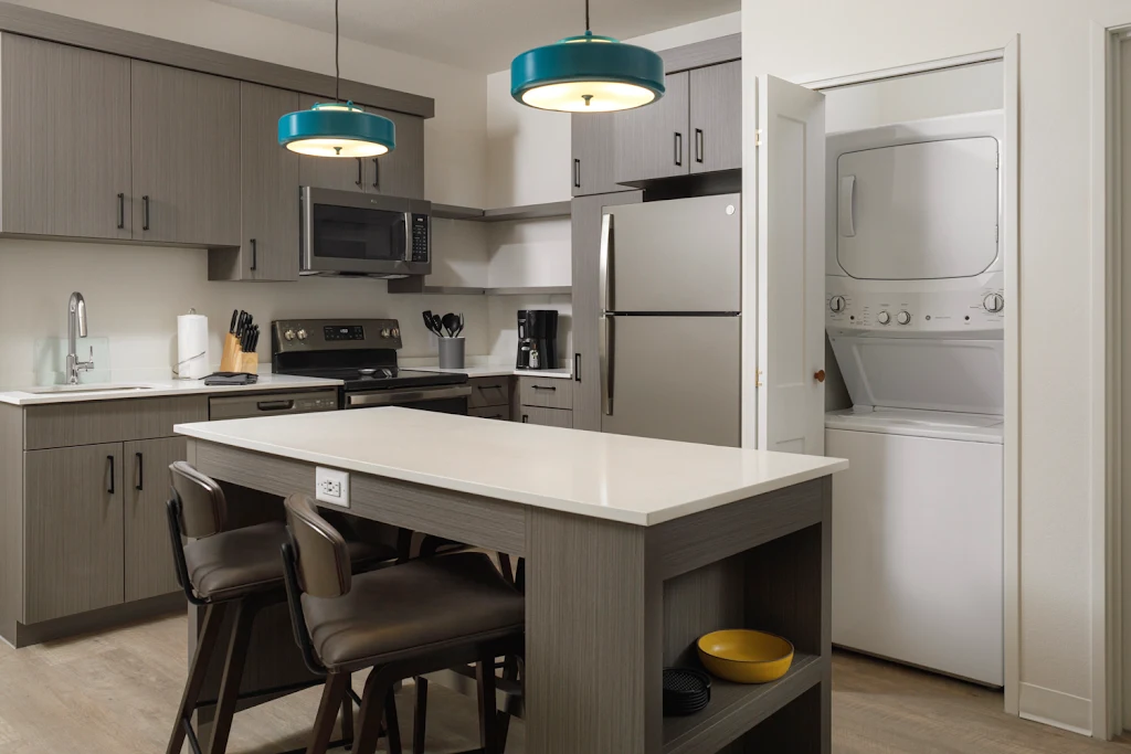 Kitchen with middle island featuring pendant lighting