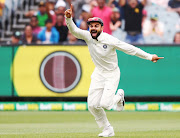 Virat Kohli of India reacts after the dismissal of Pat Cummins of Australia during day five of the Third Test match in the series between Australia and India at Melbourne Cricket Ground on December 30, 2018 in Melbourne, Australia. 