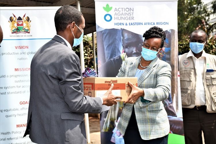 Health PS Susan Mochache receives donations of Ready to Use Therapeutic Food for counties with high burden of malnutrition at Afya House.