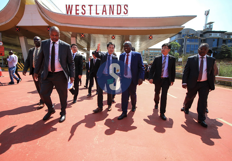 KENHA Director General Eng.Kungu Ndung’u,Transport PS Mungai Mbugua,Moja Expressway Company chief executive Steve Zhao and CRBC Deputy general manager Liu Chenghui at the Nairobi Expressway Westland Terminal during the marking of 10,000,000 expressway users since its launch.