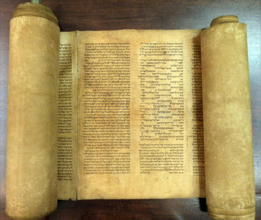 This handout photo provided by the University of Bologna on May 29, 2013 shows the oldest complete scroll of the Torah. The world's oldest complete Torah scroll has been found in a university archive in Bologna, according to an Italian professor who said the text could be from the 12th Century. The precious lambskin scroll had been classified by the university library as being from the 17th century and was named simply "Scroll Number Two". But Hebrew Studies professor Mauro Perani told AFP on Wednesday he noticed that the text did not conform to key changes in Torah writing brought about in the 12th Century.