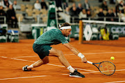 Casper Ruud of Norway hits a forehand against Holger Rune of Denmark in the quarterfinals of French Open at Roland Garros in Paris on June 1 2022.