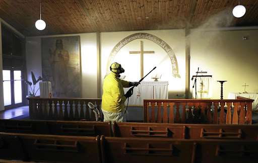 Sanitising the Evangelical Lutheran Church in Athlone, Cape Town. File photo.