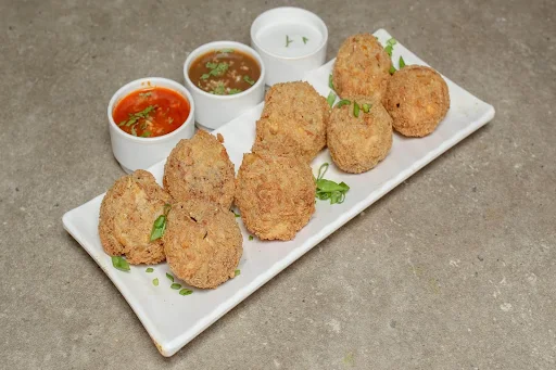 Veg Kurkure Momos [8 Pieces]