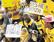 Kaizer Chiefs fans get behind their team.