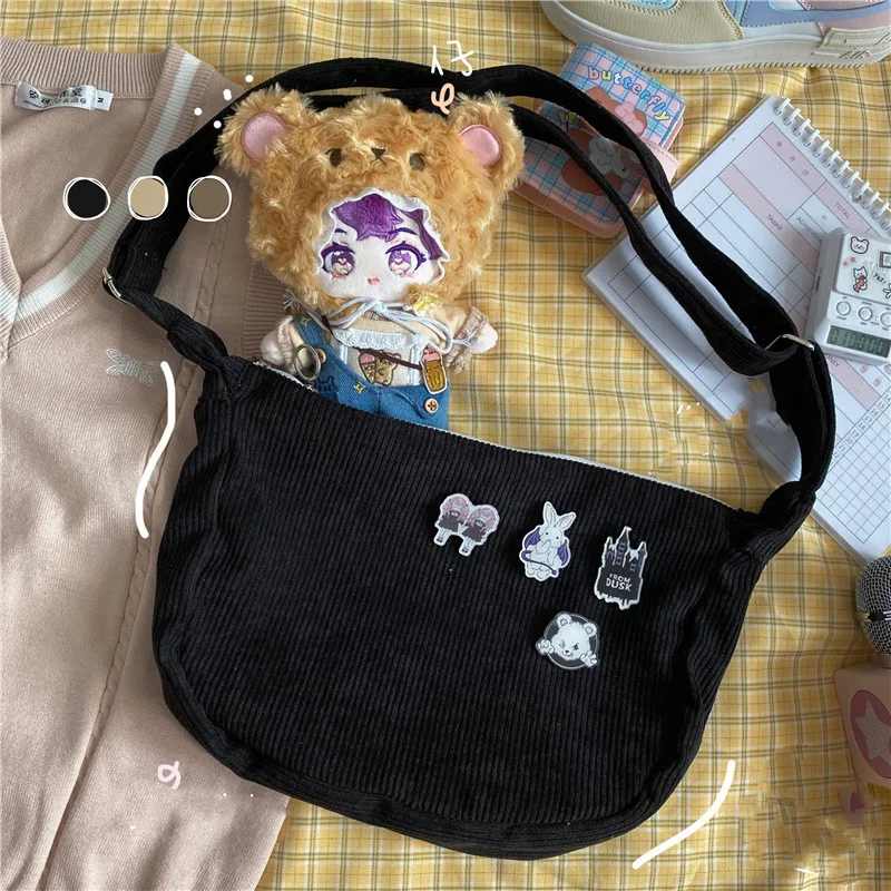 Sac bandoulière femme rétro en velours côtelé, forme dumpling, une épaule, design artistique et idéal pour vos sorties.