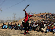 Impoverished Lonmin mineworkers demand higher wages, just days before police would open fire on them at Marikana. File photo.