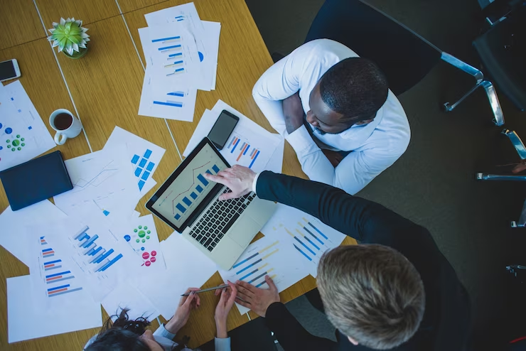 Top view of a business meeting, a snapshot of the collaborative environment in economics work experience.