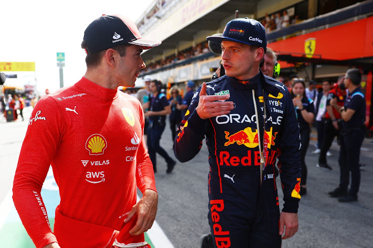 Charles Leclerc of Monaco and Ferrari and Max Verstappen of the Netherlands and Oracle Red Bull Racing