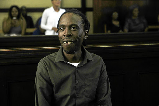 Musician Thulani Ngcobo appears in court for his wife's death.