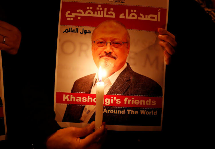 A demonstrator holds a poster with a picture of Saudi journalist Jamal Khashoggi outside the Saudi Arabia consulate in Istanbul, Turkey, on October 25 2018. Picture: REUTERS/OSMAN ORSAL