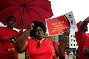 SACP members in KZN demonstrated outside the Durban magistrate's court to oppose the decision of the Constutional Court to release Chris Hani's killer Janusz Waluz on parole.
