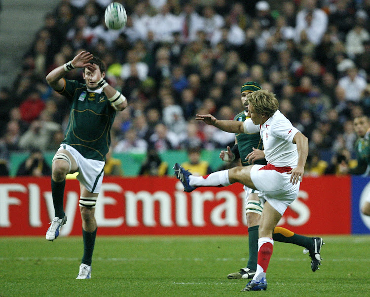 A file photo of South Africa's Danie Roussow (L) deflecting a kick by England's Jonny Wilkinson (R) in the Rugby World Cup final at the Stade de France Stadium in Saint-Denis, near Paris, October 20, 2007.