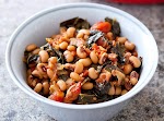Black-Eyed Peas and Greens was pinched from <a href="https://www.cookscountry.com/recipes/7291-black-eyed-peas-and-greens" target="_blank">www.cookscountry.com.</a>