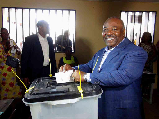 Gabon's President Ali Bongo Ondimba votes during the presidential election in Libreville, Gabon, August 27, 2016. /REUTERS