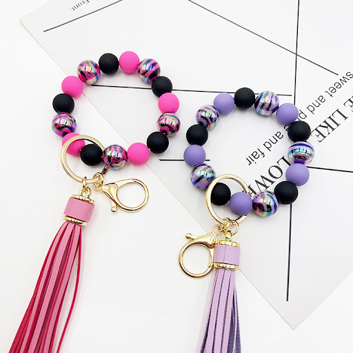 Title 10, Handmade beaded bracelet tassel key chain, a st...