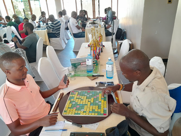 Allan Oyende (R) during the Scrabble Kenya qualifiers in Kitui on Sunday.