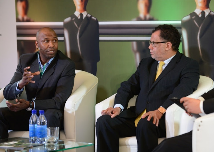 Lucas Radebe and Danny Jordaan during an event in Johannesburg.