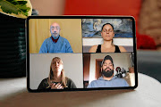 Japanese Buddhist monk Kuniatsu Suzuki, top left, teaches meditation via Zoom.