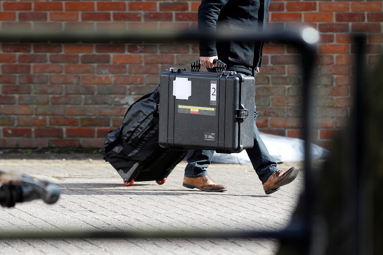 Inspectors from the Organisation for the Prohibition of Chemical Weapons (OPCW) arrive to begin work at the scene of the nerve agent attack on former Russian spy Sergei Skripal, in Salisbury, Britain, March 21, 2018.