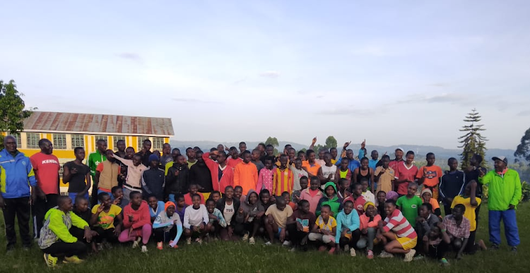 Athletes at Riooga Secondary School youth camp pose for a photo