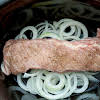 Thumbnail For Slow Cooker With Sliced Onions, Pork Tenderloin, And Water.