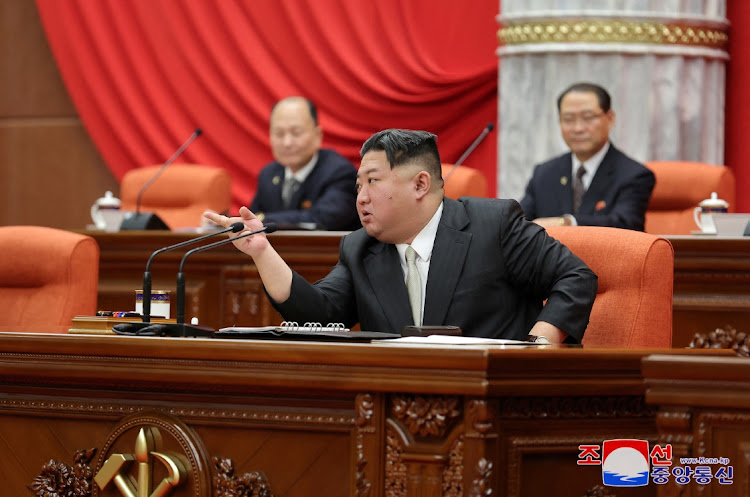 North Korean leader Kim Jong Un gestures as he attends the 8th Plenary Meeting of the 8th Central Committee of the Workers' Party of Korea, at the party's headquarters, in Pyongyang, North Korea, in this picture released by the Korean Central News Agency on December 31 2023.